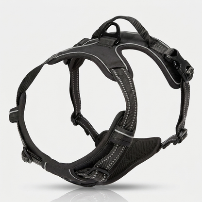 A black vest-style dog harness shown from the side against a plain background.