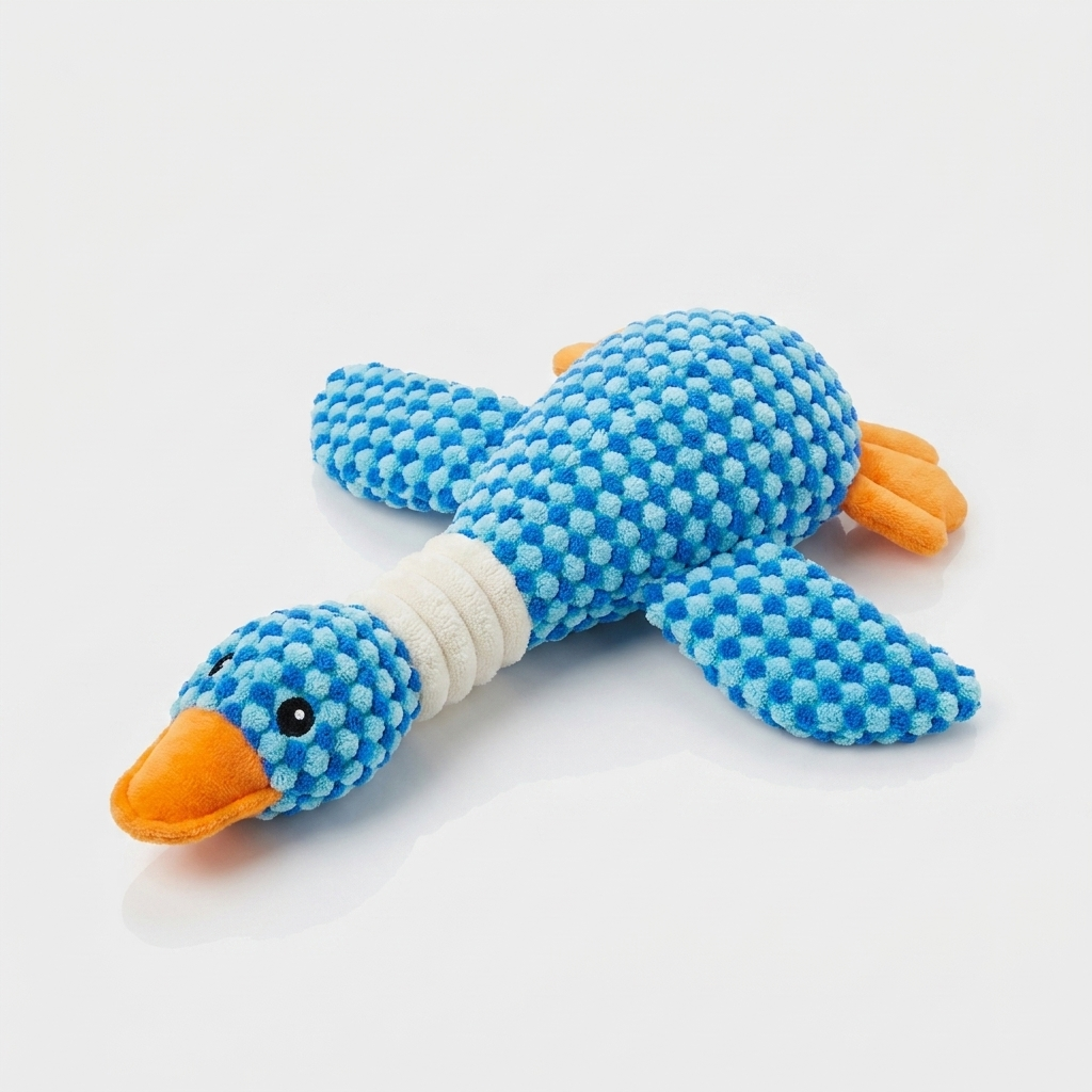 Blue checkered plush duck dog toy shown from a front angle with its head resting forward.