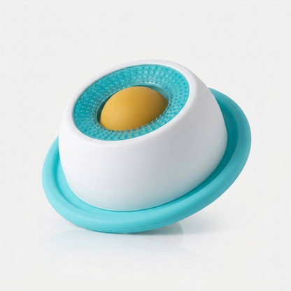 Blue and white interactive slow feeder dog toy with a textured lick surface and yellow center food dispenser, shown on a plain white background.