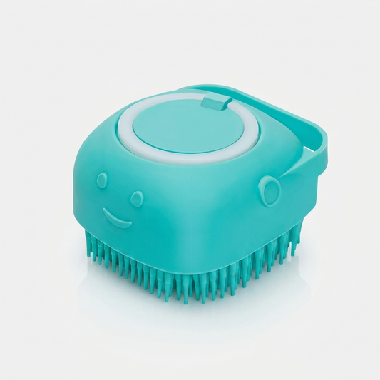 Teal silicone dog bath brush with a built-in shampoo dispenser cap and smiley face, shown on a white background.