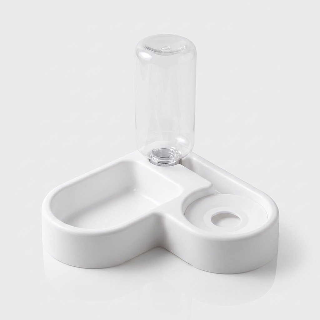 A white double bowl feeder holds dry kibble on one side and fresh water in the other.