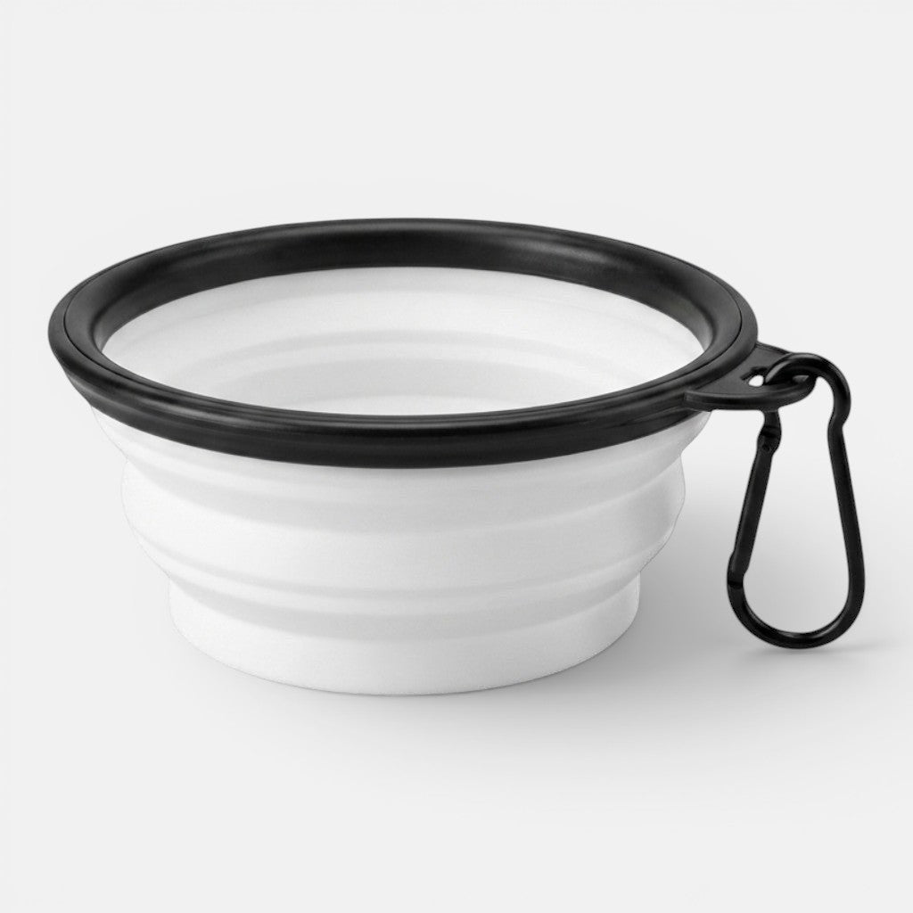 A white collapsible silicone travel bowl for dogs shown open on a plain background.